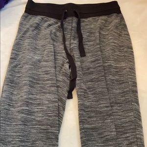 gray and black joggers/ sweats